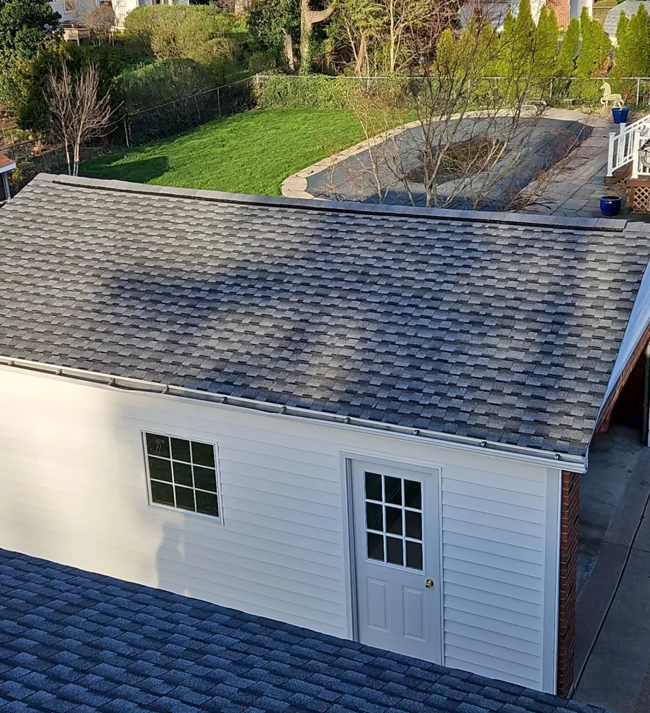 Garage With a replaced by Roofs By Brian