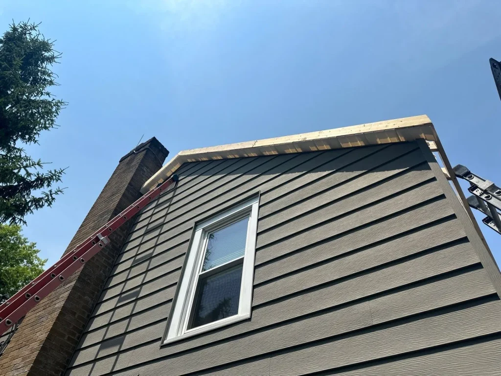 New roof eave structure being built on a residential home in Hamburg, NY