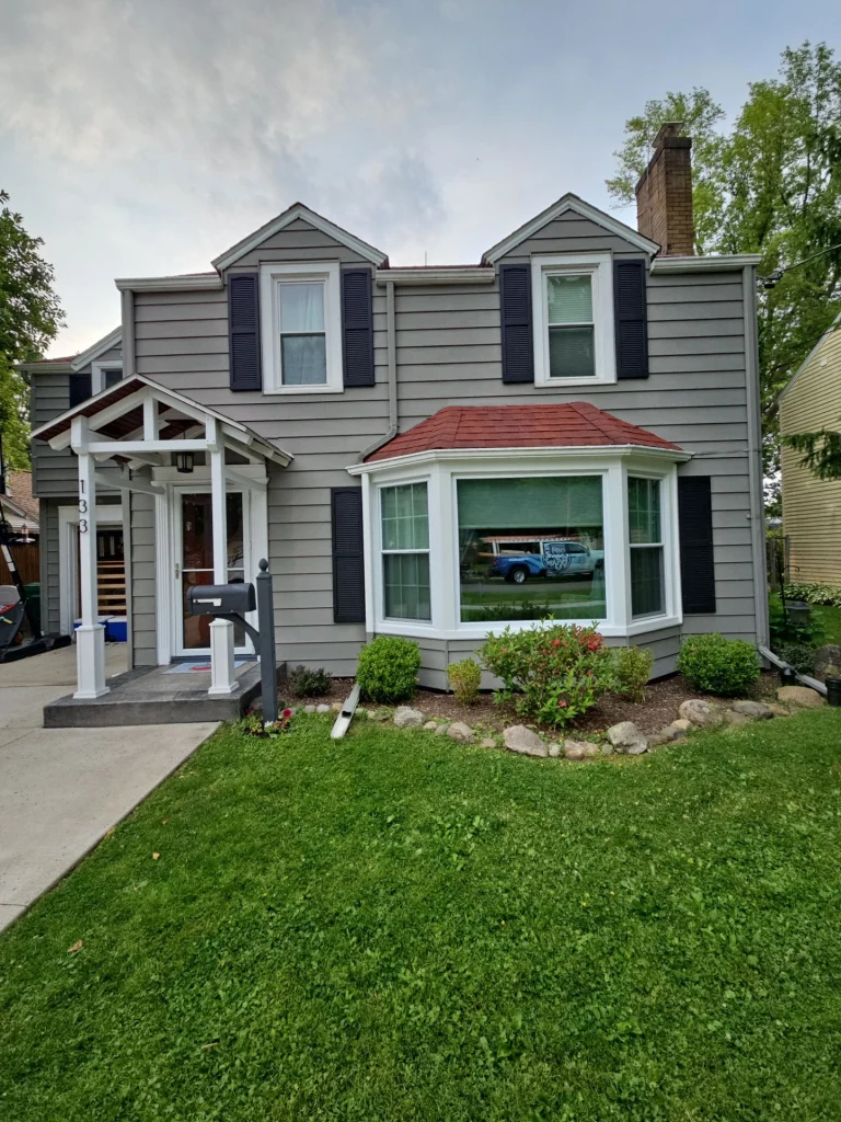 Front of Hamburg, NY home before roof replacement and eave reconstruction