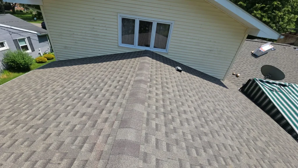 Completed partial roof replacement with GAF HDZ Weathered Wood shingles in Angola, NY