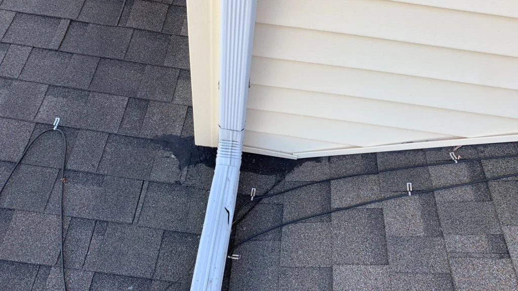 Asphalt shingle roof and gutter before roof and gutter replacement in Angola, NY